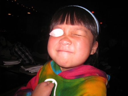 Kasen with a penny on her eye